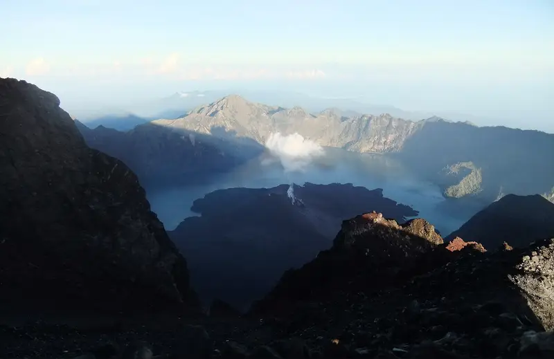 Segara Anak lake and the Barujari cone seen from the summit of Mount Rinjani